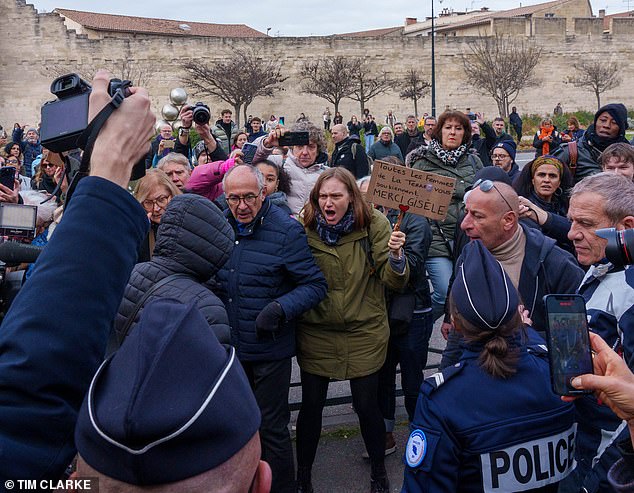 One of the sex attackers was met by an angry crowd as he tried to leave the court after the verdicts were handed down.