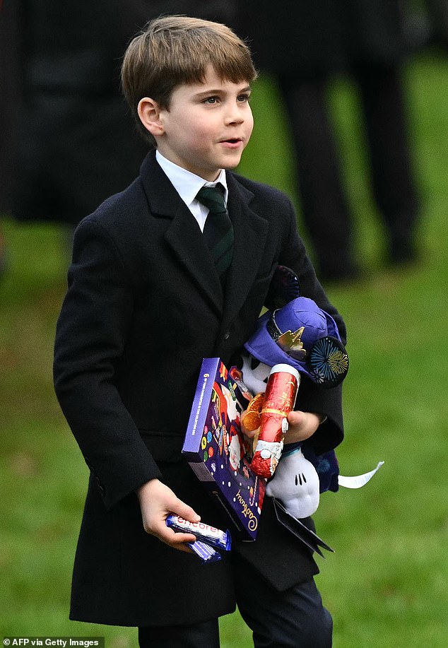 Prince Louis, six, couldn't contain his joy as the young royal received boxes of Cadbury chocolates and cuddly toys from royal fans at Sandringham on Christmas morning