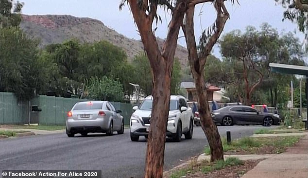 A two-month-old baby suffered a fractured skull in a horrific home invasion on the outskirts of Alice Springs on Wednesday. Police were photographed at the scene