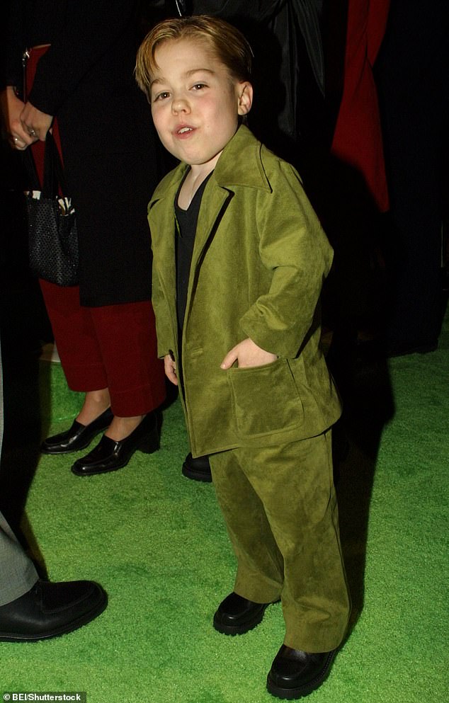 Due to his achondroplasia, Evans often played children's roles despite being an adult (pictured in the 2000 Grinch premiere)