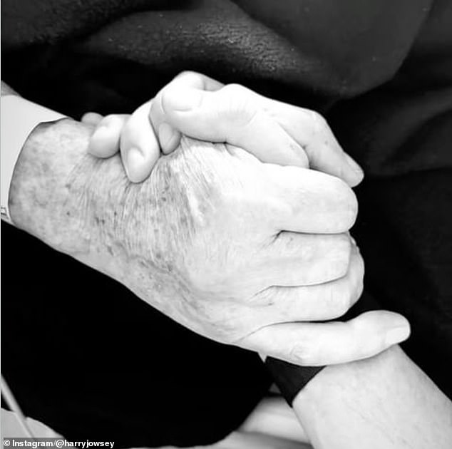 Harry included a beautiful black and white photo of him holding his father's hand