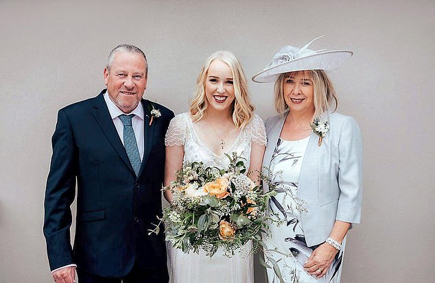 Mrs Sundgren with her parents (pictured) on her wedding day in 2017