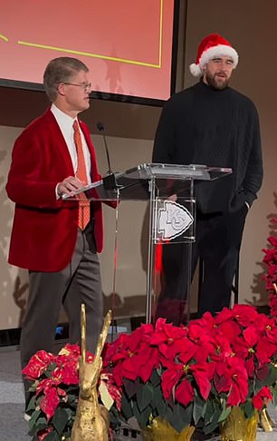 Travis Kelce appeared on stage at the Kansas City Chiefs Christmas party on Friday night