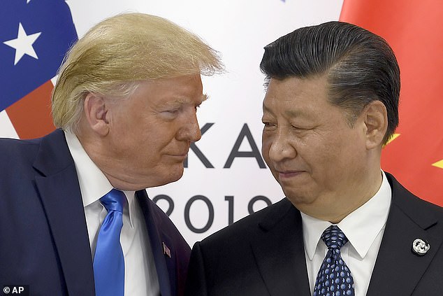 US President Donald Trump, left, meets Chinese President Xi Jinping