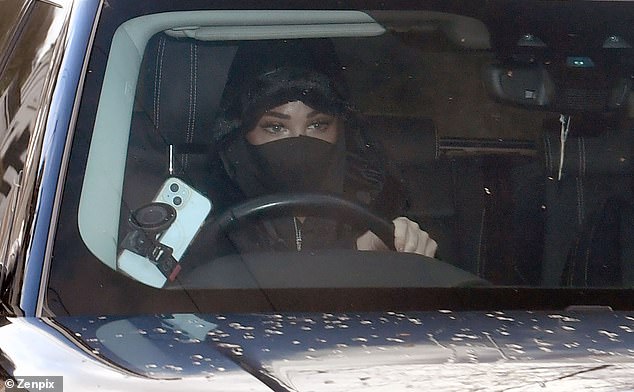 Tulisa broke down on Monday morning as she left in her car after missing the I'm A Celebrity final and flying back to Britain