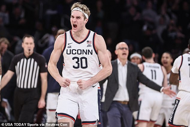 Connecticut's Liam McNeeley celebrates after hitting a triple against Gonzaga on Saturday