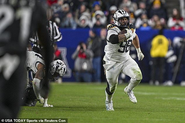 Navy's Landon Robinson became a star during his team's annual rivalry game against Army