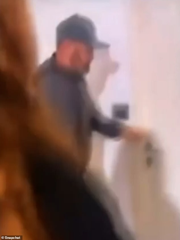 Wayne Rooney is filmed letting a mystery woman into his