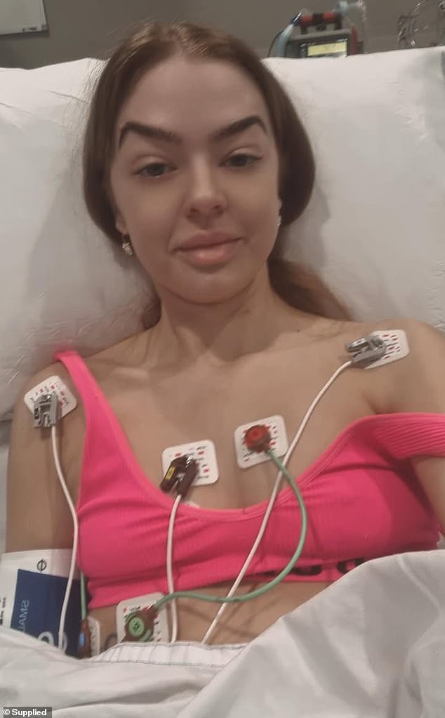 Kirsten, in her mid-30s, was told by doctors that if she had not gone to the emergency room she would have died the next day (she is pictured during a recent hospital visit)