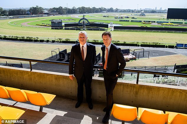 Mr Minns is accused of accelerating a deal to turn Sydney's Rosehill Gardens Racecourse (pictured, Mr Minns and ATC chairman Peter McGauren on the track) into a new suburb after an informal meeting with Mr McMahon