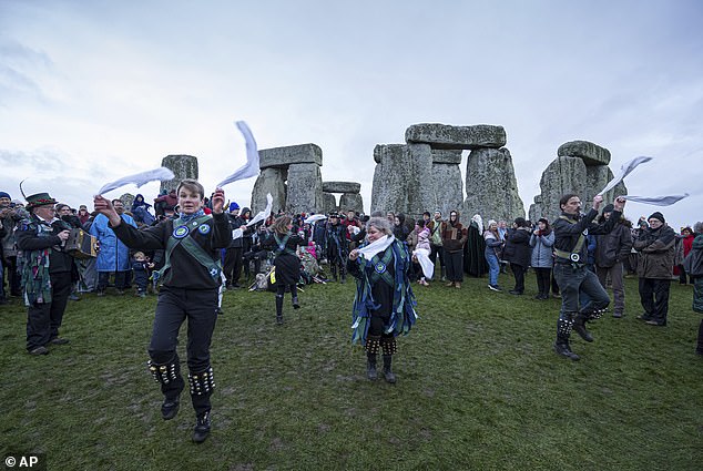 Morris dancers take part in the winter solstice celebration