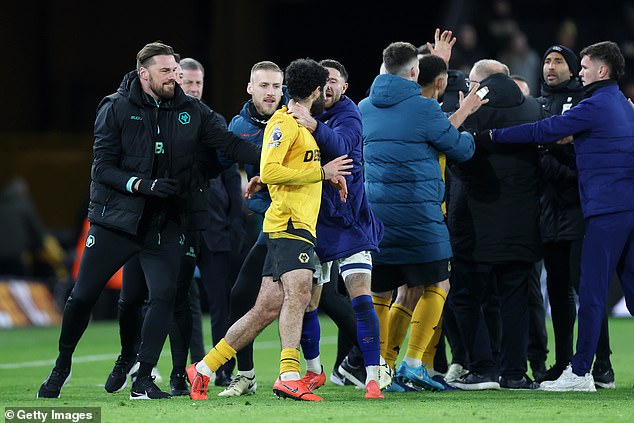 Ipswich's Wes Burns had his hand on Rayan Ait-Nouri's neck after Wolves' 2-1 defeat at home