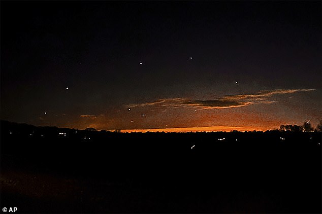 The flying objects, like the one seen in the evening sky near Lebanon Township, New Jersey, are larger than drones used by hobbyists, witnesses have noted, raising questions about their proximity to critical infrastructure and sensitive locations.