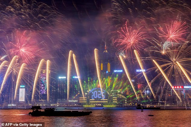 HONG KONG: Fireworks light up the midnight sky over Victoria Harbor during New Year's Day celebrations 2025 in Hong Kong on January 1, 2025