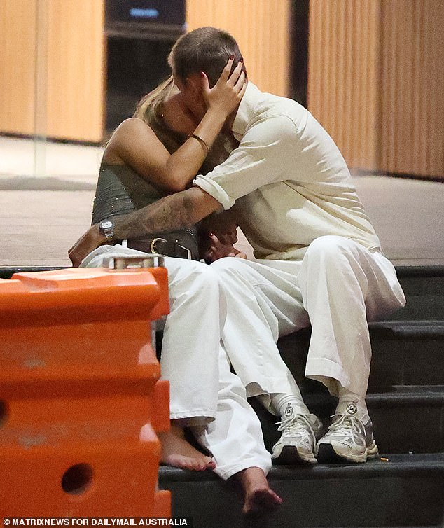 Revelers were seen taking a moment to relax before battling the crowd for a way home