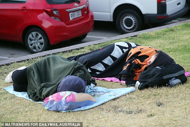 Partygoers were seen sleeping before the spectacular sunrise