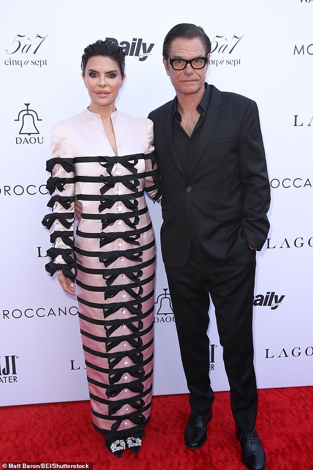 Meanwhile, her husband Harry Hamlin also posted a New Year's Eve post in preparation for 2025. However, instead of a revealing photo, he posted a video teasing a new addition to his pasta sauce line, Harry's Famous Sauces; pictured in April in Beverly Hills