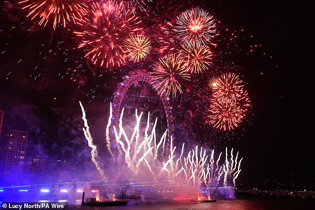 Fireworks light up the sky above the London Eye