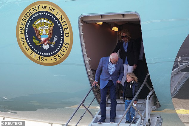 Biden steps off Air Force One in Philadelphia, Pennsylvania, with his grandson Beau