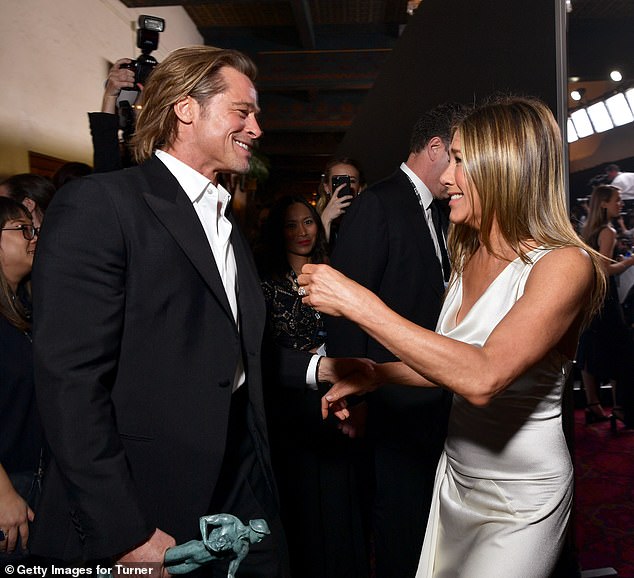 Aniston and Pitt have managed to remain on friendly terms in the years since his split from Jolie in 2016 – most notably sharing a warm hug together at the 2020 SAG Awards (pictured)