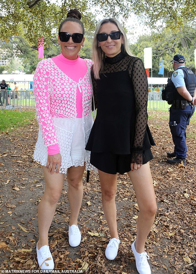 Similar sunglasses? Bill. Matching shoes? Bill. These two women are ready to party