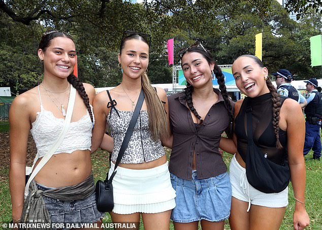 If you're going to dance to electronic music, it's a good idea to tie your hair up, as these young ladies know