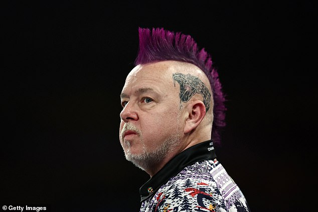 Scotsman Peter Wright is known for his brightly colored appearance and is nicknamed 'Snakebite' - which may not come as a surprise, as he painted the creature on his head