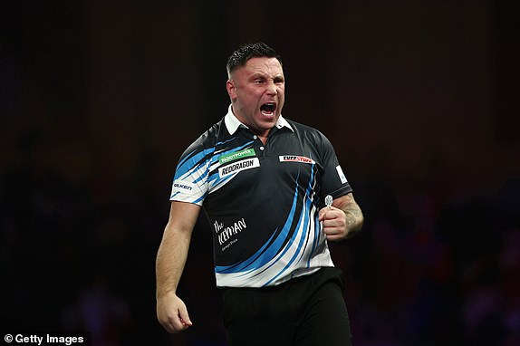 LONDON, ENGLAND – DECEMBER 29: Gerwyn Price of Wales reacts against Jonny Clayton of Wales during their fourth round match on day twelve of the 2024/25 Paddy Power World Darts Championship at Alexandra Palace on December 29, 2024 in London, England. (Photo by James Fearn/Getty Images)