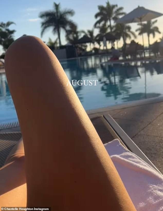 The beauty was then seen posing with one leg by the pool as she shared a photo from a luxury holiday snap in August