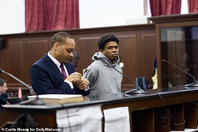 Hawkins, 23, looked on indifferently as he was arraigned on New Year's Day for attempted murder and second-degree assault in Manhattan Criminal Court.