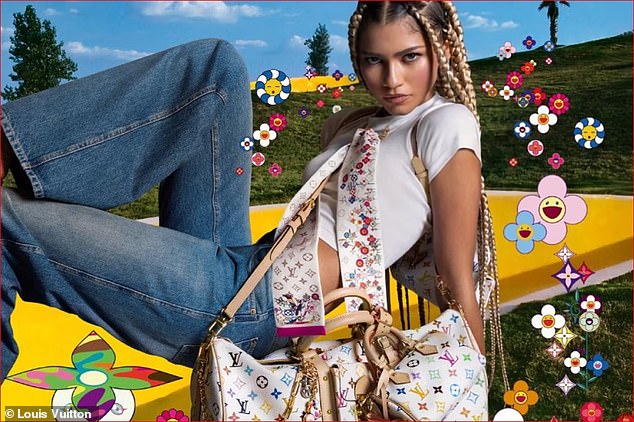 For a different look, she wore a white crop top and bootcut jeans with a pair of 6am Mules, worth £770, from the collection of Japanese artist Takashi Murakami