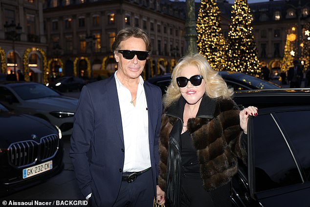 The star smiled at onlookers as she wore a fur coat, leggings and boots, while wearing black sunglasses and her blonde hair in soft waves over her shoulders