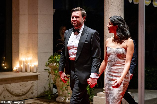 Vice President-elect JD Vance (left) and Usha Vance (right) were the first of the VIPs to enter Mar-a-Lago during Tuesday night's New Year's Eve party — although Elon got prime seats