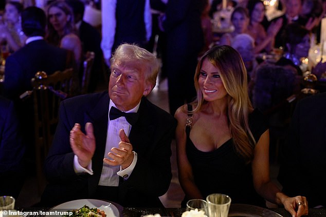 President-elect Donald Trump (left) and former and future first lady Melania Trump (right) react to one of the performances during Tuesday evening's New Year's Eve party