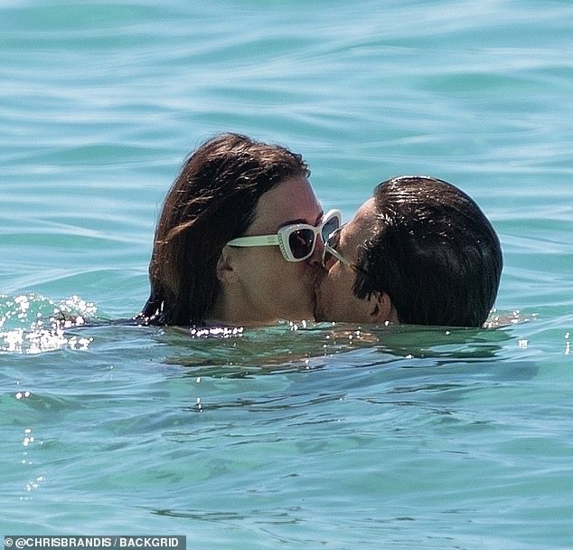 The couple of 15 years packed on the PDA while enjoying a refreshing dip