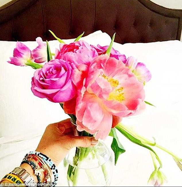 The bracelet appeared in several of the star's Instagram posts, including a photo of a beautiful bouquet of pink flowers