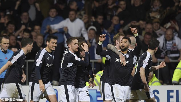 Wighton receives praise from his teammates and a delirious Dens Park after his late winner