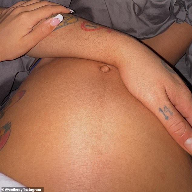 Leray posted a snapshot of her burgeoning baby bump with her boyfriend's hand resting on it