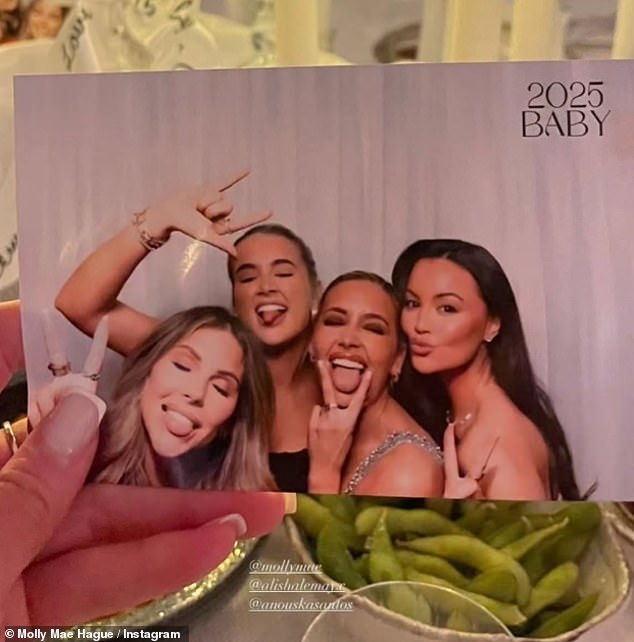 Molly looked in good spirits as she posed for a mirror selfie early in the evening before later posing in a photobooth with her friends