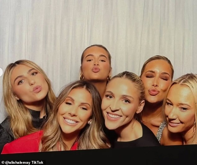 In one group shot, the mother-of-one flashed her pout to the camera, before sticking her tongue out and holding up a rock 'n' roll hand sign in less than a second