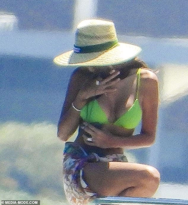 Pia showed off her incredible figure in a vibrant green two-piece, which she paired with a multi-colored sarong