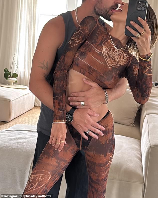 For the evening, Ruby showed off her incredible figure as she went braless under a daring sheer co-ord set as she packed on the PDA with her fiancé Shannan Dodd