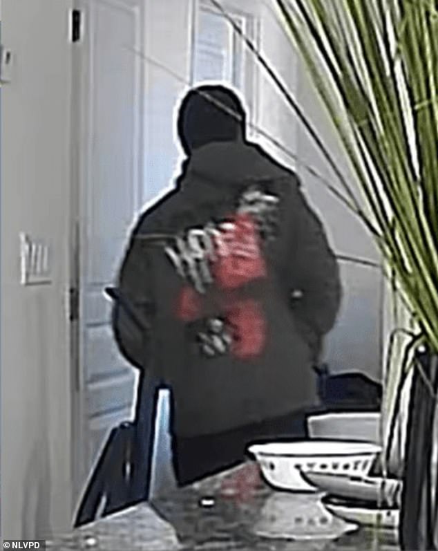 Jones wore a gray hoodie with designs on the front and back, which was visible in CCTV footage released by police