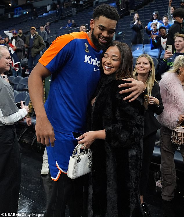 The media personality cheered on her beau and Knicks player Karl-Anthony Towns as the team defeated the Utah Jazz by a score of 119-103; seen in December 2024 in Minnesota