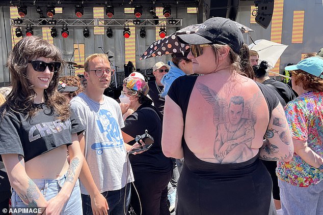 Fed Square quickly reached maximum capacity as fans rushed to get a spot at the concert, while hundreds of people were left on blankets on a hilltop above the river