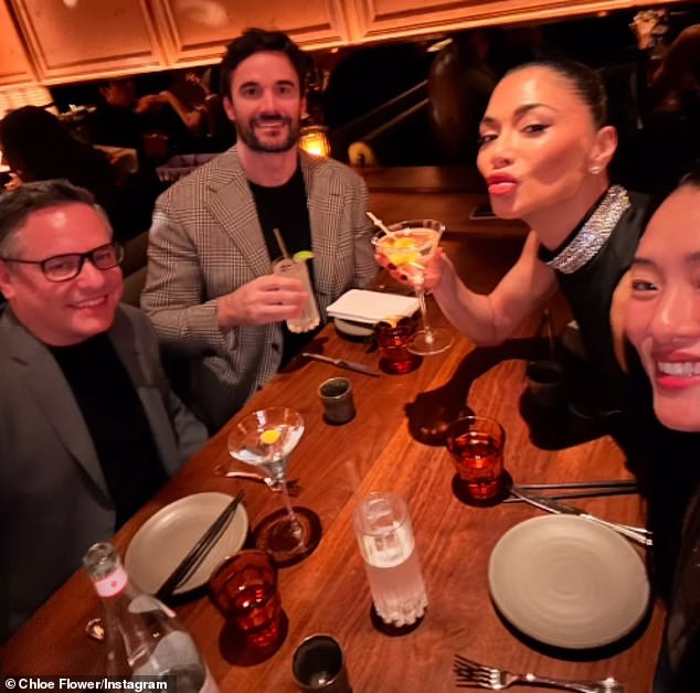 Hours earlier, the pair joined pianist Chloe Flower and entrepreneur Mike Sepso at the Michelin-starred COTE Korean Steakhouse for a New Year's Eve dinner.