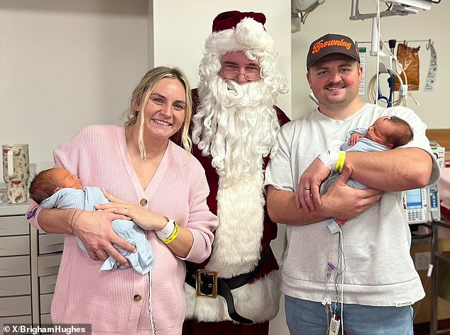 The first time mum was told by doctors and nurses that she had had a 'perfect birth', however, Morgan suffered fainting spells in the days after her delivery, prompting a hospital visit. Pictured: Morgan and Sam holding their twin brothers, Hudson and Georgia