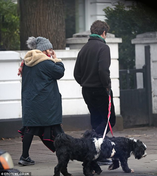 The couple took a walk around North London with their two dogs