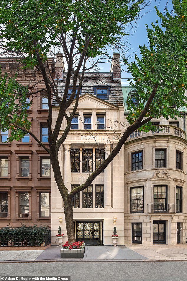 Located in Manhattan's upscale Lennox Hill neighborhood, the property (pictured, center) was first listed in November 2022 before being relisted in 2024 by Adam D. Modlin at the Modlin Group