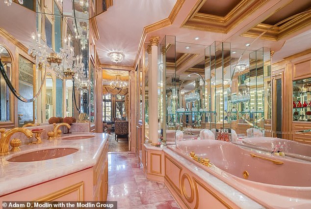 Ivana's master bathroom features pastel pink sinks, pink marble floors and, of course, gold accents